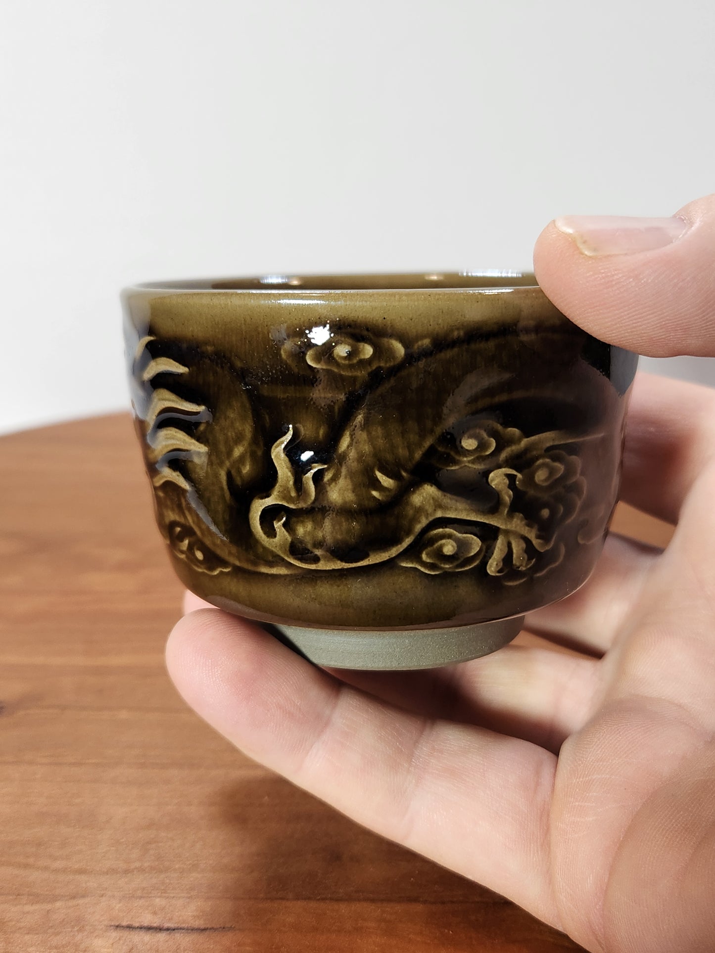“Dragon Heart” Olive-Bronze Crackle Glaze Jian Zhan Tea Cup with Raised Dragon