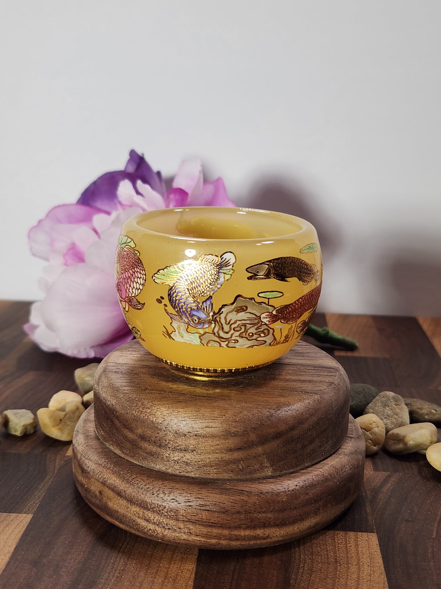 Golden glass Tea tasting cup, painted fish scene, ornate bottom