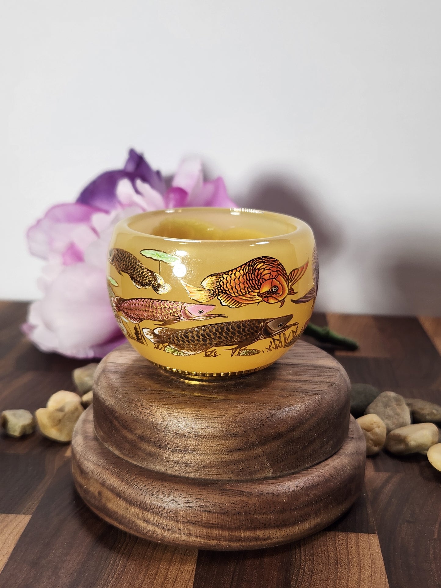 Golden glass Tea tasting cup, painted fish scene, ornate bottom
