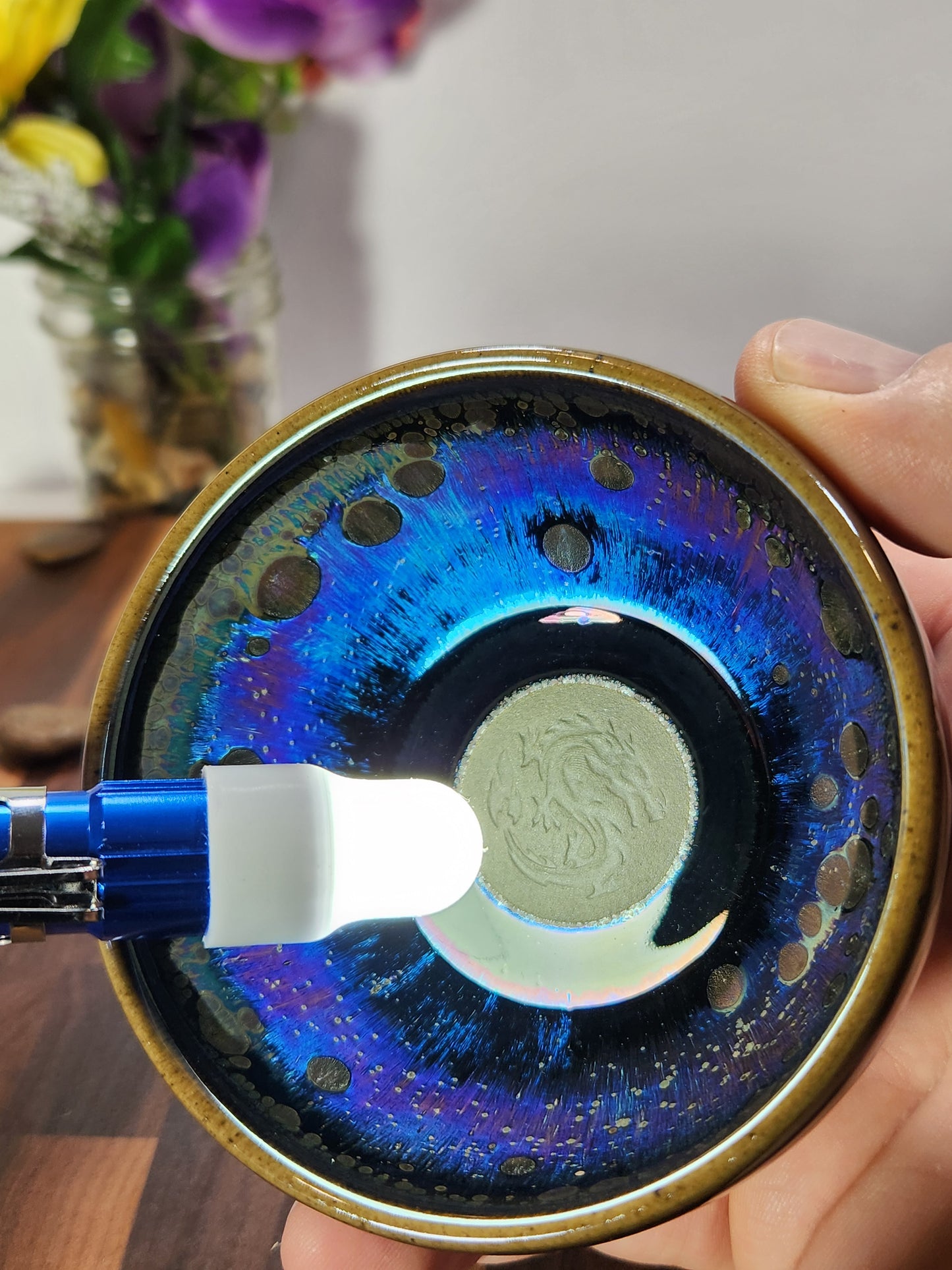 Iridescent Purple Oil-Drop Tea Bowl with Carved Dragon
